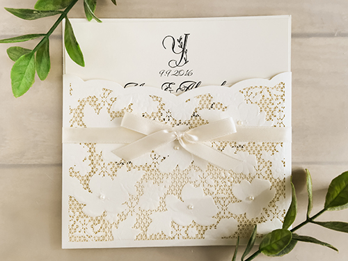Invitation lc34: White, Cream Smooth, Antique Ribbon - This is a pocket style laser cut wedding card.  The insert is loose.  There is a 3/8 antique ribbon bow.