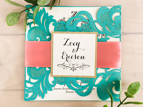 Invitation lc40: Tiffany Shimmer, Champagne Glitter, Cream Smooth, Coral Ribbon - This is a tiffany shimmer damask pattern gate fold laser cut wedding invite.  There is a coral ribbon with a champagne glitter cover tag backing.