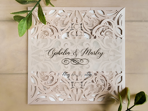 Invitation lc97: Blush Shimmer, White Smooth - This is a four flap laser cut wedding invitation in the blush shimmer color.  There is a vellum belly band wrapped around.