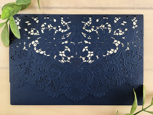 Invitation lc9: Glittering Navy, Cream Smooth - Bi-fold laser cut invitation in glittering navy. V shaped envelope cover with lace design. Includes a sweetheart shaped pocket.