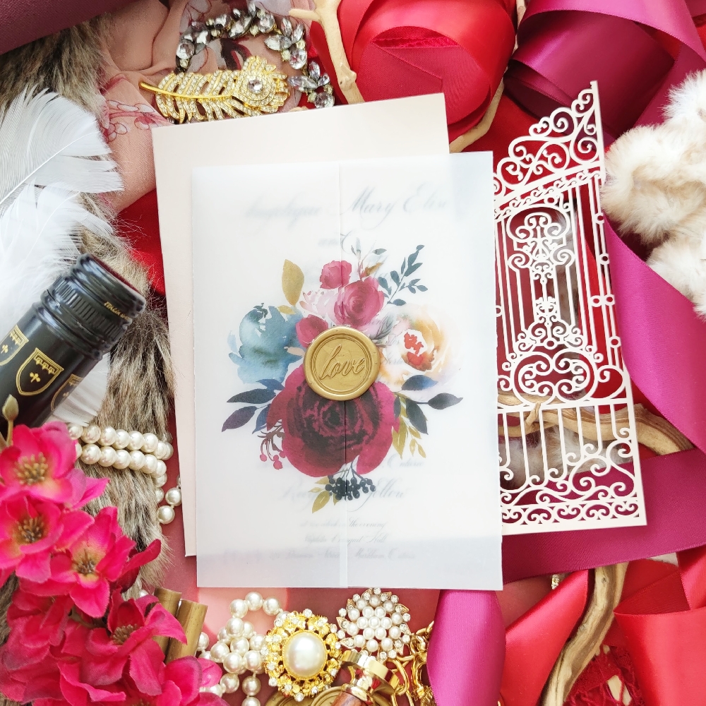 A beautiful floral vellum wrap or intricate lasercut detail can add a lot of elegance to any wedding invitation. Choose from a variety of colors and designs.