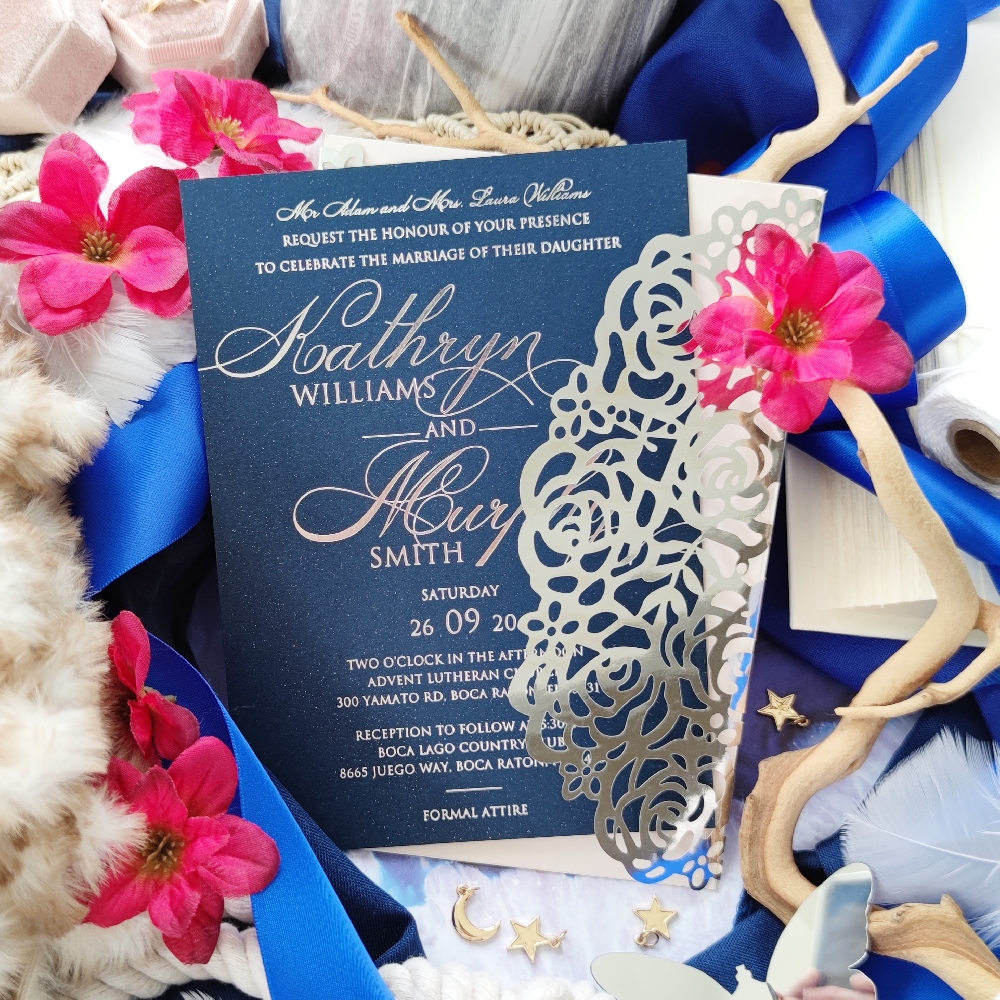 A beautiful silver foil wedding invitation with matching foil lasercut is such an opulent pairing. Customize foil colors and paper options to fit your wedding theme.