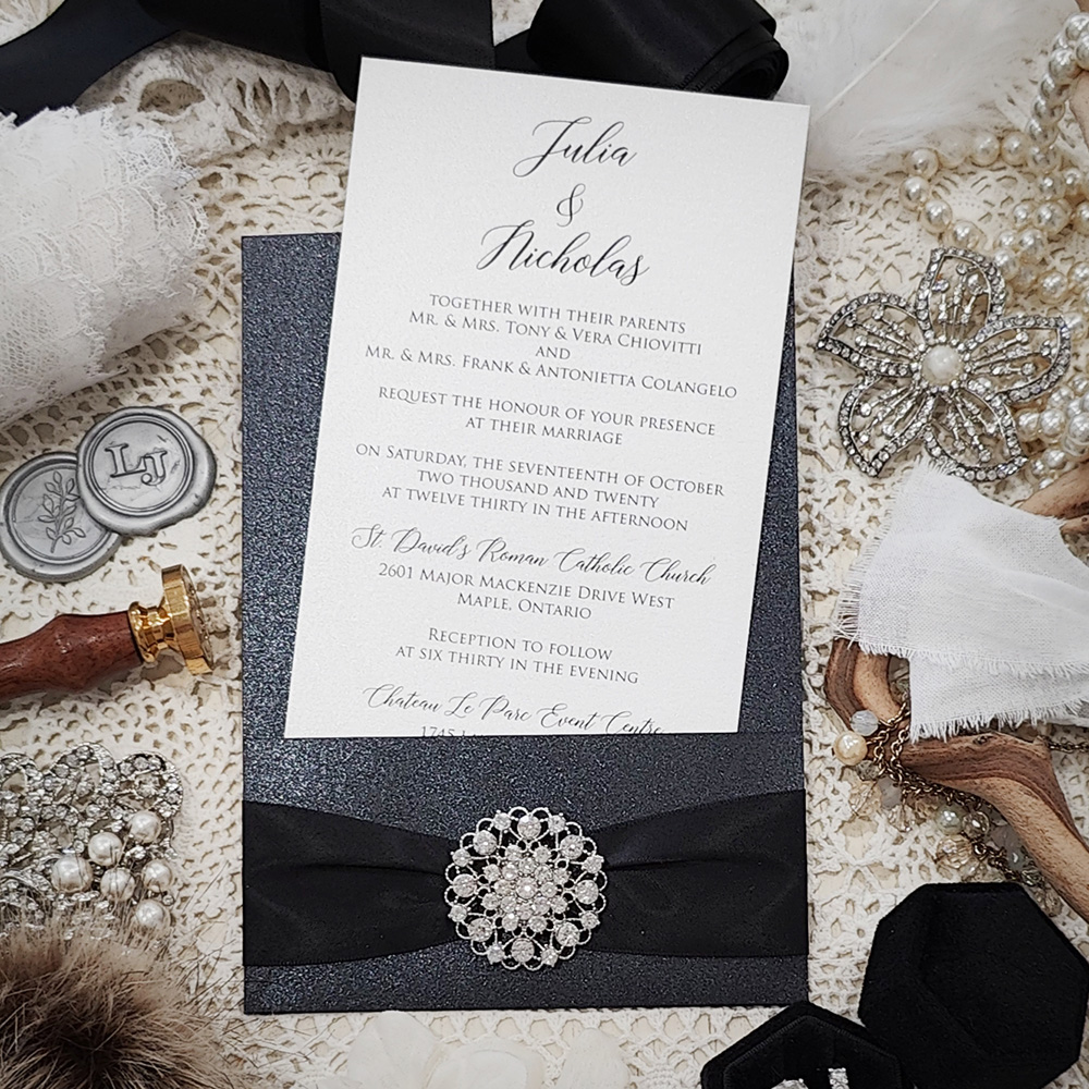 Invitation 3507: Black Pearl, White Smooth, Black Ribbon, Brooch/Buckle X - Black pocket style invite with a black ribbon and rhinestone brooch.