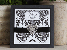 Invitation 913: Black Pearl, Black Linen, White Smooth, Beau Rivage, Monotype Corsiva, Black Ribbon, Brooch/Buckle U