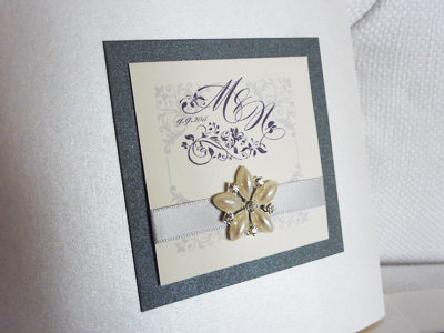Invitation 916: Antique Pearl, Charcoal Pearl, Cream Smooth, Burgues Script, Phyllis, Silver Ribbon, Brooch/Buckle B