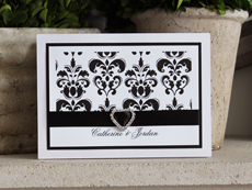 Invitation 919: Ice Pearl, Black Linen, White Smooth, Flemish Script, Myriad Pro Light, Black Ribbon, Brooch/Buckle K
