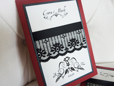 Invitation 927: Red Linen, Black Pearl, White Smooth, Aqualine 2, Calligraph 421, Black Ribbon