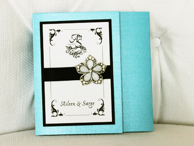 Invitation 931: Turquoise Pearl, Black Linen, White Smooth, Ex Ponto, Myriad Pro Light, Black Ribbon, Brooch/Buckle A7