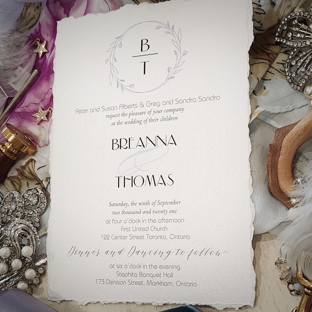 Invitation 2826: Ice Pearl - Deckle edge wedding card printed on an ice pearl paper with a monogram design.