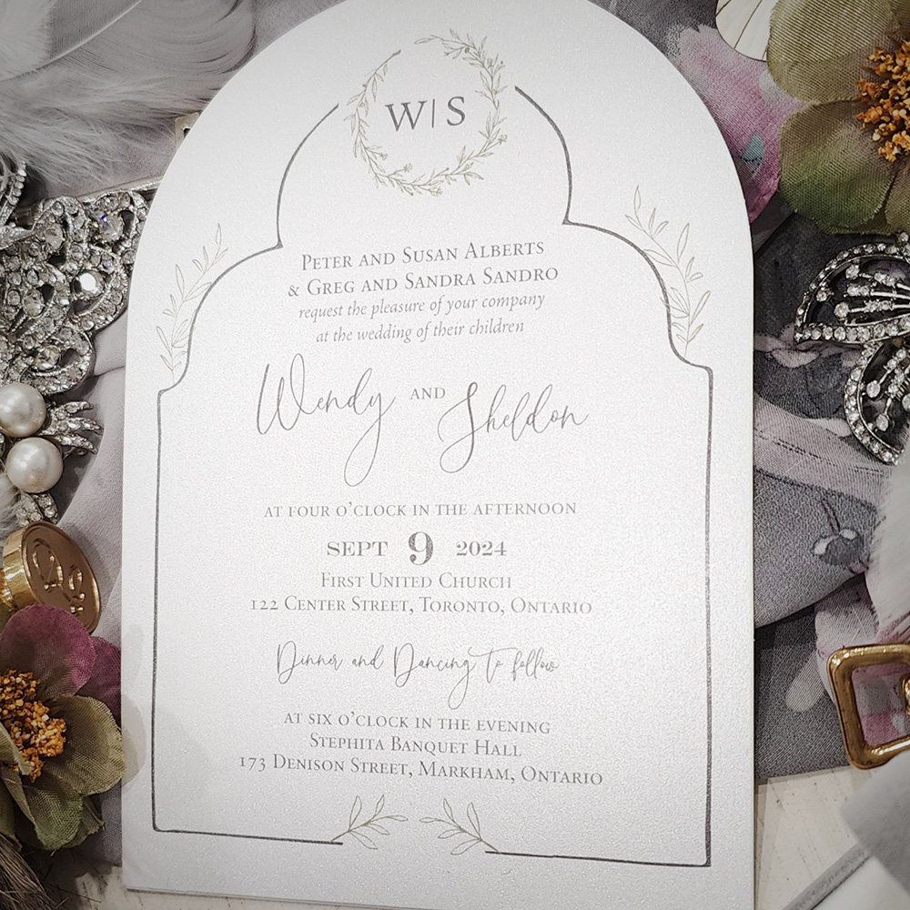 Invitation 2849: Ice Pearl - Arched cut wedding card with an arch design printed on the layout with hints of florals.