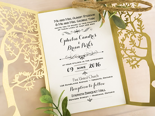 Invitation lc39: Metallic Gold, Cream Smooth - This is the metallic gold laser cut wedding invite.  The pattern is a tree design.  There is a rustic twine tied around the card.