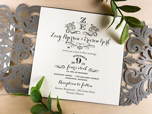 Invitation lc43: Grey Shimmer, Blush Pearl, Cream Smooth - This is a grey shimmer laser cut gate fold wedding invitation.  There is a double layer cover tag that uses the blush pearl and champagne glitter.