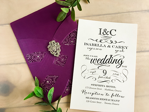 Invitation lc70: Purple Shimmer, Brooch/Buckle A17 - This is a purple shimmer pocket style laser cut wedding invitation.  There is a rhinestone brooch glued to the front.