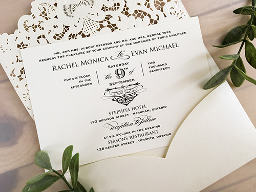 Invitation lc89: Ivory Shimmer, Brooch/Buckle A6 - This is an ivory shimmer pocket style laser cut wedding invite.  There is a rhinestone brooch on the flap.
