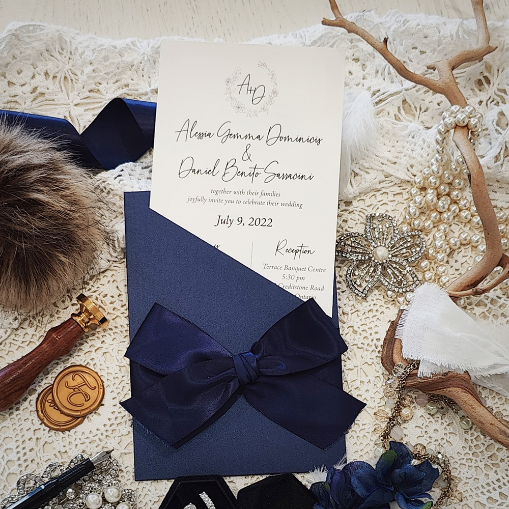 Invitation 3404: Navy Pearl, Cream Smooth, Navy Ribbon - Navy pocket style card with a loose cream insert.  A large 1.5 inch navy bow tied around.