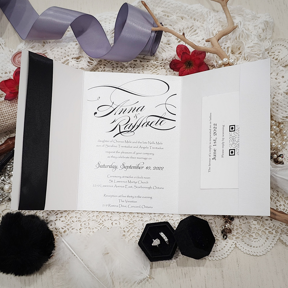 Invitation 3104: Ice Pearl, Silver Wax, Black Ribbon - Pocketfold wedding card in portrait layout opening horizontally.  Black ribbon and silver love wax seal.