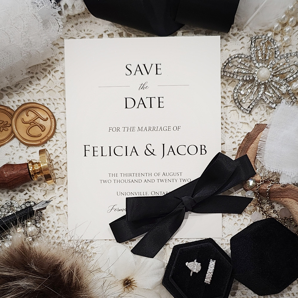 Invitation 8311:  - save the date on white gold with black bow