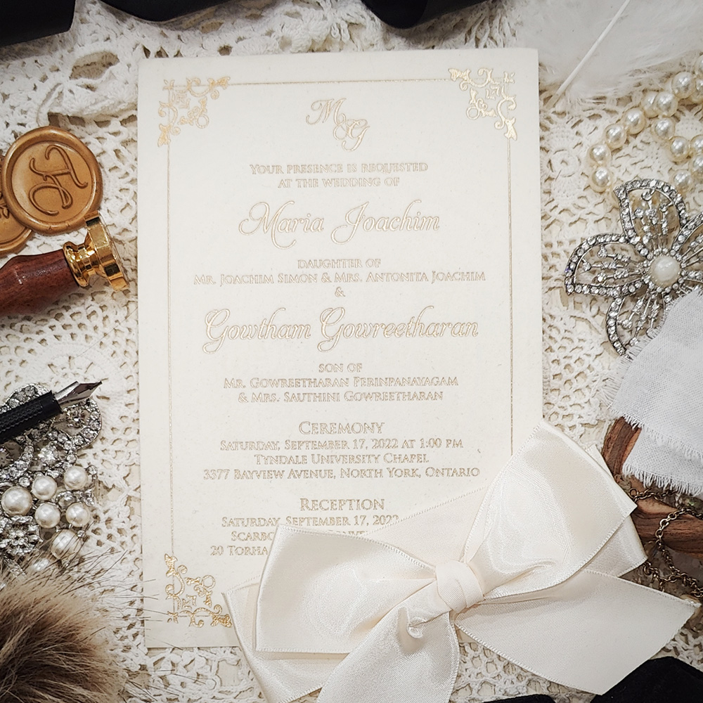 Invitation 5406: Ivory Velvet, Antique Ribbon - Ivory Velvet wedding invitation with gold foil printed layout and antique bow.