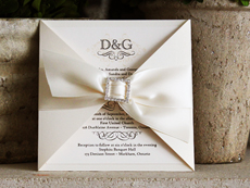 Invitation 702: White Gold, Cream Smooth, Origins, High Tower, Antique Ribbon, Brooch/Buckle O