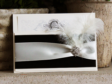 Invitation 716: White Gold, White Gold, Cream Smooth, GE LaraScript, High Tower, Black Ribbon, Black Ribbon, Antique Ribbon, Brooch/Buckle A8, Feather Color White