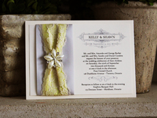 Invitation 722: Ivory Pearl, Cream Smooth, Academy Engraved, High Tower, Silver Ribbon, Canary Ribbon, Cream Lace, Brooch/Buckle B