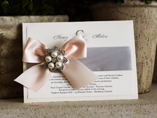 Invitation 738: Ivory Pearl, Cream Smooth, Yesterday, High Tower, Silver Ribbon, Blush Ribbon, Brooch/Buckle T