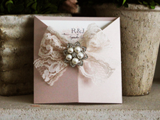 Invitation 762: Blush Pearl, Cream Smooth, The Nauti Gal, High Tower, Cream Lace, Brooch/Buckle T