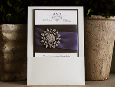 Invitation 766: Champagne Pearl, Charcoal Pearl, Cream Smooth, Devon, High Tower, Charcoal Ribbon, Charcoal Ribbon, Lilac Ribbon, Brooch/Buckle A11