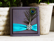 Invitation 772: Colbalt Pearl, Dark Purple, Cream Smooth, Embassy, High Tower, Peacock Ribbon, Brooch/Buckle A16, Feather Color Peacock