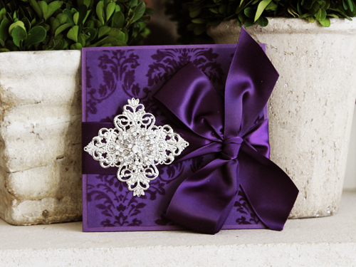 Invitation 1047: Purple Pearl, Cream Smooth, Purple Ribbon, Brooch/Buckle A19, Metal Filigree F4 - Silver