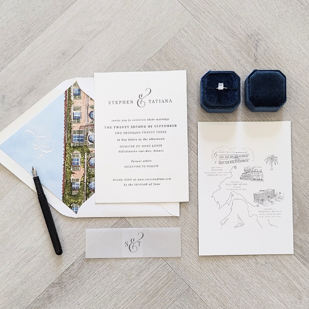 This wedding card is an example of a letterpress wedding invitation print method on a white cotton paper.  The ink color is charcoal.  There is a vellum belly band with the couples monogram printed to wrap around the card.  There is a secondary insert with a map of the venue.  The envelope has a printed sketch of the venue along with the monogram design at the top.
This wedding took place in the Cote d\'Azure in southern France.  The name of the venue is Domaine du Mont Leuze in Villefranche-sur-Mer, France.
Domaine du Mont Leuze is an exclusive private estate in the hills above Villefranche-sur-Mer, on the French Riviera, making it a spectacular destination for luxury weddings.  Domaine du Mont Leuze combines French Riviera glamour with the feel of a secluded private retreat. Its panoramic views, luxurious ambiance, and ability to host large or intimate celebrations make it a dream destination for couples seeking a high-end yet private wedding experience. This wedding card is an example of a letterpress wedding invitation print method on a white cotton paper.  The ink color is charcoal.  There is a vellum belly band with the couples monogram printed to wrap around the card.  There is a secondary insert with a map of the venue.  The envelope has a printed sketch of the venue along with the monogram design at the top.
This wedding took place in the Cote d\'Azure in southern France.  The name of the venue is Domaine du Mont Leuze in Villefranche-sur-Mer, France.
Domaine du Mont Leuze is an exclusive private estate in the hills above Villefranche-sur-Mer, on the French Riviera, making it a spectacular destination for luxury weddings.  Domaine du Mont Leuze combines French Riviera glamour with the feel of a secluded private retreat. Its panoramic views, luxurious ambiance, and ability to host large or intimate celebrations make it a dream destination for couples seeking a high-end yet private wedding experience.