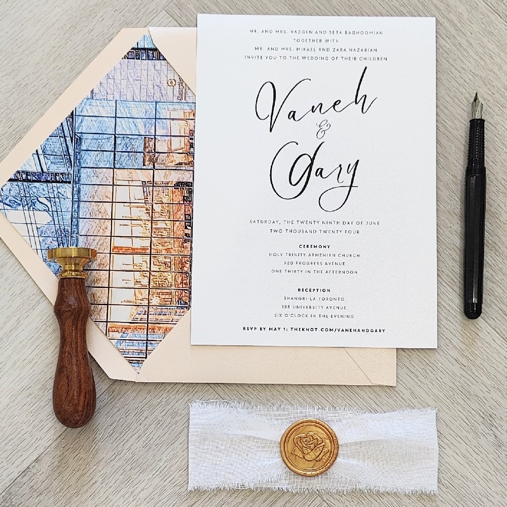 This is a single card wedding invite with a white linen torn edge ribbon with gold wax seal embellishment.  There is a blush shimmer envelope with a venue sketch image depicting the reception room the wedding is taking place.
This wedding was held at the Shangri-La in Toronto, Canada.
The Shangri-La Hotel Toronto is a five-star hotel located at 188 University Avenue in the heart of downtown. It blends modern Asian-inspired design with sleek urban elegance, making it ideal for a stylish city wedding. The hotel’s floor-to-ceiling windows and contemporary décor create a sophisticated atmosphere for both intimate and large celebrations. This is a single card wedding invite with a white linen torn edge ribbon with gold wax seal embellishment.  There is a blush shimmer envelope with a venue sketch image depicting the reception room the wedding is taking place.
This wedding was held at the Shangri-La in Toronto, Canada.
The Shangri-La Hotel Toronto is a five-star hotel located at 188 University Avenue in the heart of downtown. It blends modern Asian-inspired design with sleek urban elegance, making it ideal for a stylish city wedding. The hotel’s floor-to-ceiling windows and contemporary décor create a sophisticated atmosphere for both intimate and large celebrations.