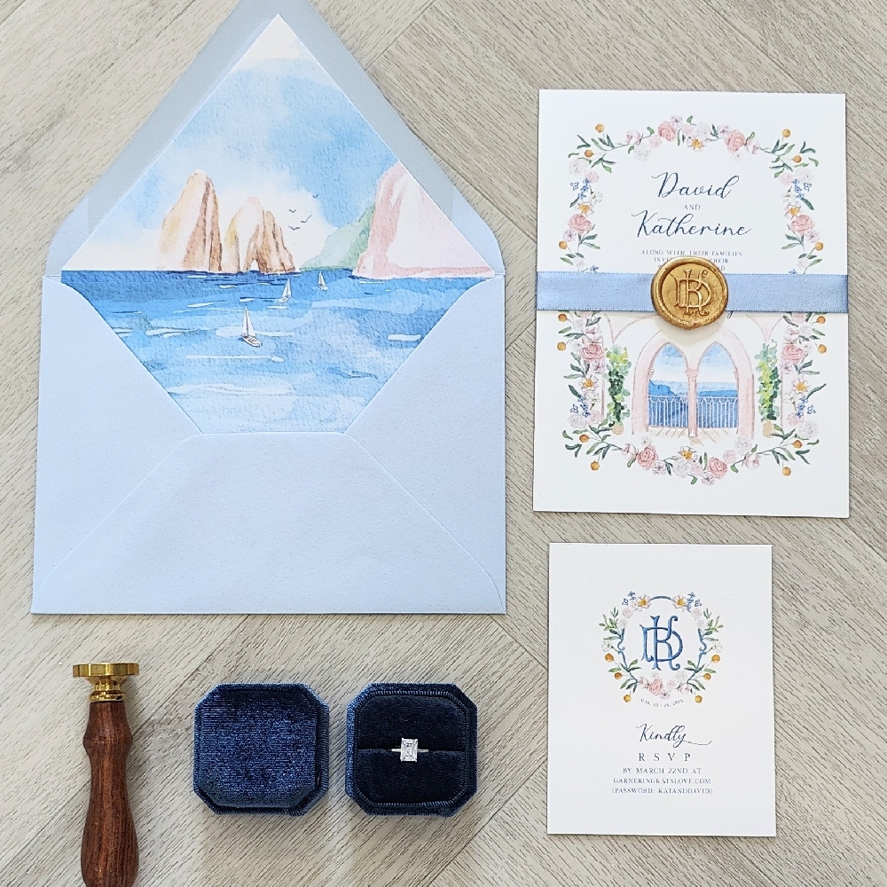 This is a single card wedding invite printed on a white cotton paper.  There is a light blue ribbon stripe with a custom monogram gold wax seal embellishment.  There is a matching blue azure envelope with a printed design envelope liner of the location of the wedding.
This wedding took place in Italy, on the island of Capri!
A wedding in Capri, Italy is the epitome of Mediterranean romance, blending dramatic coastal scenery with old-world Italian charm. This tiny island off the Amalfi Coast is famous for its limestone cliffs, turquoise waters, and chic piazzas, making it an unforgettable destination for both intimate elopements and larger celebrations. Couples often choose breathtaking ceremony spots such as cliffside terraces overlooking the Faraglioni rock formations, lush private gardens, or historic chapels like Santa Sofia and Certosa di San Giacomo. Sunset boat rides around the island or a post-ceremony cruise to the Blue Grotto add a magical touch.  ocal planners can help navigate Italian paperwork for a civil or symbolic ceremony, and many couples opt for an outdoor reception featuring fresh seafood, local wines, and classic Capri flavors like limoncello and lemon-infused desserts. With easy ferry access from Naples or the Amalfi Coast, guests can turn the celebration into a memorable vacation filled with island exploration, designer shopping, and romantic Mediterranean sunsets. This is a single card wedding invite printed on a white cotton paper.  There is a light blue ribbon stripe with a custom monogram gold wax seal embellishment.  There is a matching blue azure envelope with a printed design envelope liner of the location of the wedding.
This wedding took place in Italy, on the island of Capri!
A wedding in Capri, Italy is the epitome of Mediterranean romance, blending dramatic coastal scenery with old-world Italian charm. This tiny island off the Amalfi Coast is famous for its limestone cliffs, turquoise waters, and chic piazzas, making it an unforgettable destination for both intimate elopements and larger celebrations. Couples often choose breathtaking ceremony spots such as cliffside terraces overlooking the Faraglioni rock formations, lush private gardens, or historic chapels like Santa Sofia and Certosa di San Giacomo. Sunset boat rides around the island or a post-ceremony cruise to the Blue Grotto add a magical touch.  ocal planners can help navigate Italian paperwork for a civil or symbolic ceremony, and many couples opt for an outdoor reception featuring fresh seafood, local wines, and classic Capri flavors like limoncello and lemon-infused desserts. With easy ferry access from Naples or the Amalfi Coast, guests can turn the celebration into a memorable vacation filled with island exploration, designer shopping, and romantic Mediterranean sunsets.