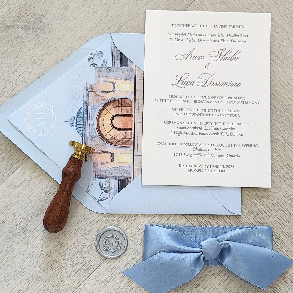 This is a letterpress wedding invitation card on a 450 GSM White Cotton paper with Charcoal ink.  The layout uses a classic formal invitation fonts.  The invitation is paired with an azure blue envelope that has a printed design of the wedding venue as an envelope liner.
This wedding took place a recently renovated Chateau Le Parc in Vaughan, Ontario.
Château Le Parc is an elegant wedding venue in Vaughan, just north of Toronto, known for its grand ballrooms, stylish décor, and exceptional service. The property blends modern sophistication with classic European charm—think crystal chandeliers, soaring ceilings, and dramatic lighting that make a romantic backdrop for ceremonies and receptions. Their spaces can accommodate everything from an intimate celebration of 50 guests to large weddings of 1,000 or more. Couples can host an on-site indoor ceremony or take advantage of the beautifully landscaped courtyard for an outdoor option during warmer months. This is a letterpress wedding invitation card on a 450 GSM White Cotton paper with Charcoal ink.  The layout uses a classic formal invitation fonts.  The invitation is paired with an azure blue envelope that has a printed design of the wedding venue as an envelope liner.
This wedding took place a recently renovated Chateau Le Parc in Vaughan, Ontario.
Château Le Parc is an elegant wedding venue in Vaughan, just north of Toronto, known for its grand ballrooms, stylish décor, and exceptional service. The property blends modern sophistication with classic European charm—think crystal chandeliers, soaring ceilings, and dramatic lighting that make a romantic backdrop for ceremonies and receptions. Their spaces can accommodate everything from an intimate celebration of 50 guests to large weddings of 1,000 or more. Couples can host an on-site indoor ceremony or take advantage of the beautifully landscaped courtyard for an outdoor option during warmer months.