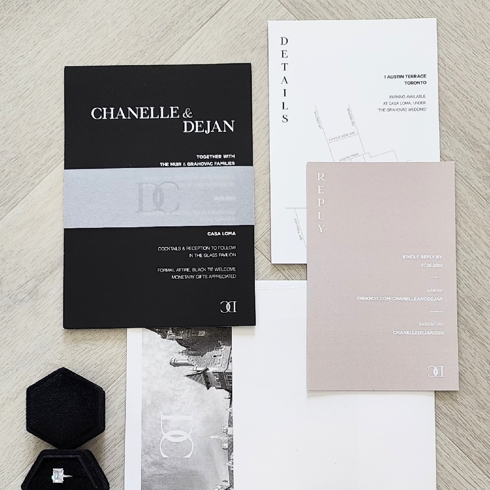 This is a single card full black color invitation with a vellum belly band.  There are 2 extra inserts for the RSVP and details with a map.  There is a custom monogram printed on the vellum band, as well as on the envelope liner in the white envelope.  The RSVP card is printed with a solid blush background.  The details map card is printed on a matte white paper.
This event took place at the Casa Loma in Toronto.
Casa Loma is one of Toronto’s most iconic wedding venues, offering a fairy-tale castle experience right in the city. Built in 1914, this historic mansion sits atop a hill with sweeping views of the Toronto skyline and Lake Ontario, making it a stunning backdrop for ceremonies and photography. Inside, you’ll find soaring ceilings, ornate woodwork, grand staircases, stained-glass windows, and crystal chandeliers—perfect for couples who want a regal and romantic atmosphere. This is a single card full black color invitation with a vellum belly band.  There are 2 extra inserts for the RSVP and details with a map.  There is a custom monogram printed on the vellum band, as well as on the envelope liner in the white envelope.  The RSVP card is printed with a solid blush background.  The details map card is printed on a matte white paper.
This event took place at the Casa Loma in Toronto.
Casa Loma is one of Toronto’s most iconic wedding venues, offering a fairy-tale castle experience right in the city. Built in 1914, this historic mansion sits atop a hill with sweeping views of the Toronto skyline and Lake Ontario, making it a stunning backdrop for ceremonies and photography. Inside, you’ll find soaring ceilings, ornate woodwork, grand staircases, stained-glass windows, and crystal chandeliers—perfect for couples who want a regal and romantic atmosphere.