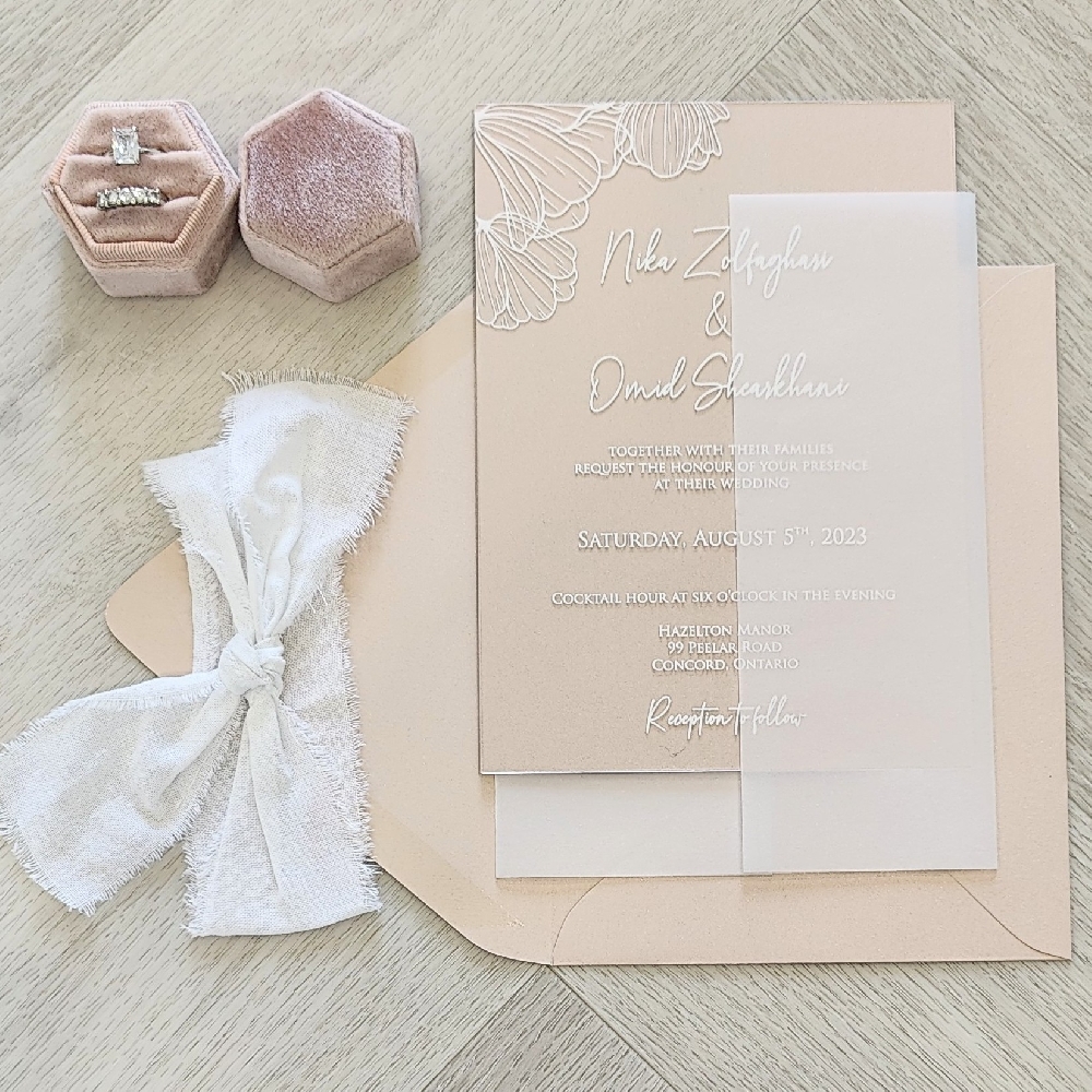 This is a 1 mm clear Acrylic Wedding Invite with a blush pearl paper backing and a full vellum wrap enclosure.  It all goes into a blush pearl envelope.  White UV ink is used for the print method.  There is a floral graphic on the top left corner of the layout design.
This wedding took place at the Hazleton Manor in Concord, Ontario, Canada!
Hazleton Manor is a popular wedding and event venue located in Vaughan, Ontario—just north of Toronto—well known for its elegant atmosphere and high-end service. This is a 1 mm clear Acrylic Wedding Invite with a blush pearl paper backing and a full vellum wrap enclosure.  It all goes into a blush pearl envelope.  White UV ink is used for the print method.  There is a floral graphic on the top left corner of the layout design.
This wedding took place at the Hazleton Manor in Concord, Ontario, Canada!
Hazleton Manor is a popular wedding and event venue located in Vaughan, Ontario—just north of Toronto—well known for its elegant atmosphere and high-end service.
