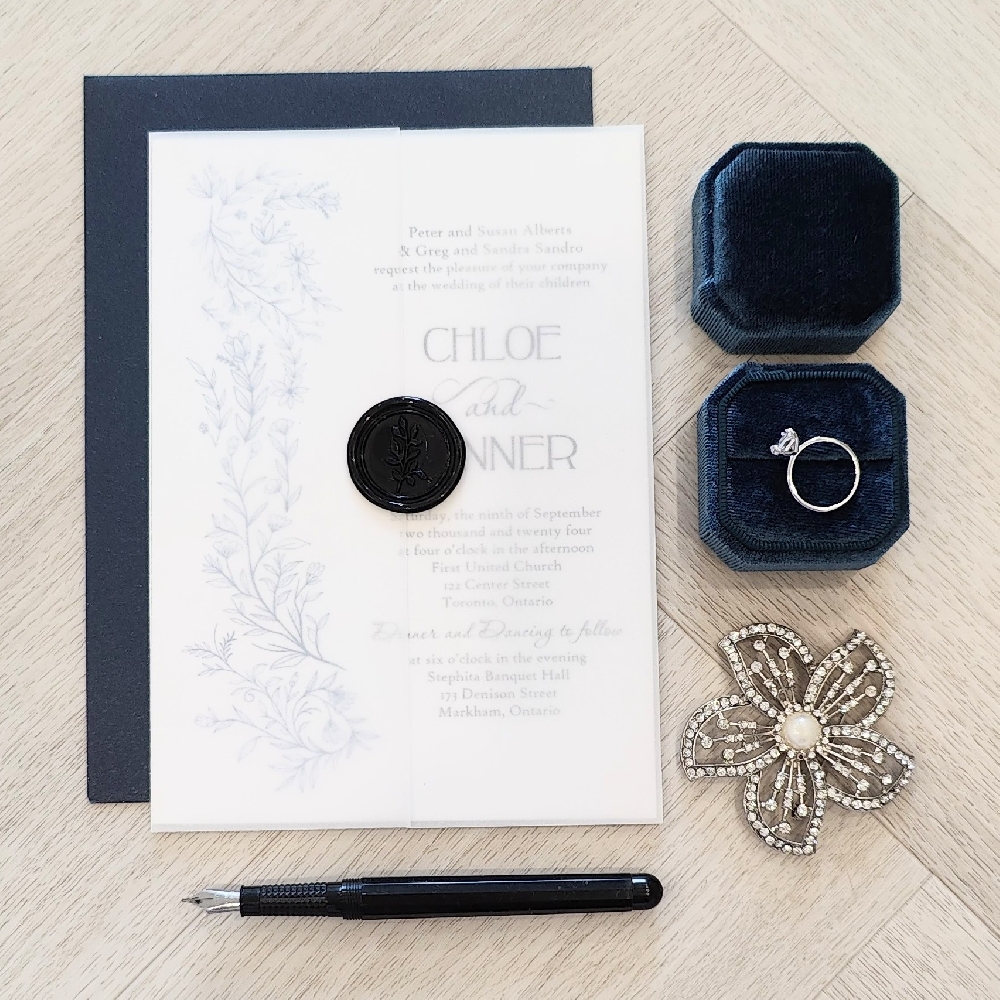 Single card wedding invite with vellum wrap and black wax seal
