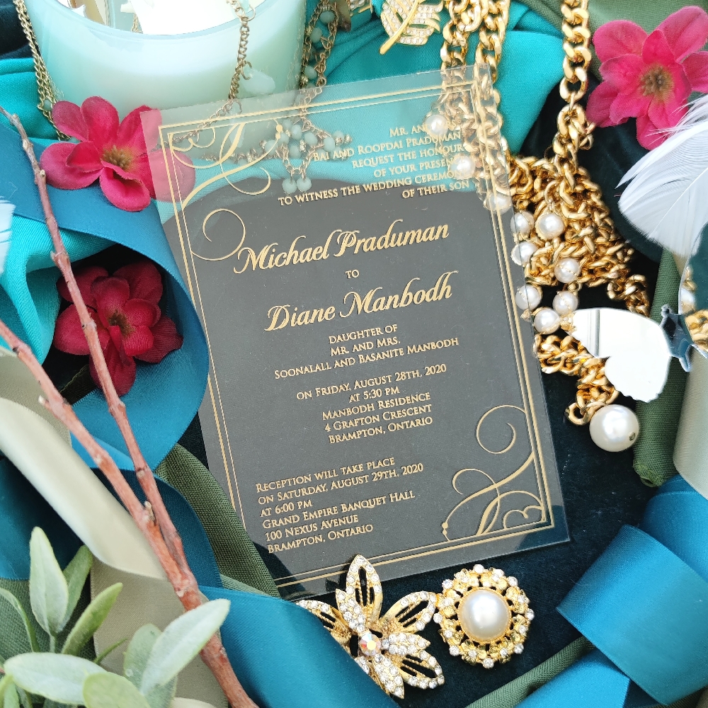 Here is an acrylic wedding invitation with beautiful gold print. Simple yet elegant and sure to wow your wedding guests.