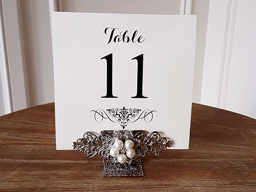 Other Accessory TableNumber2:  - This is a single card table number that goes into a combo brooch stand.  The table number is double sided.