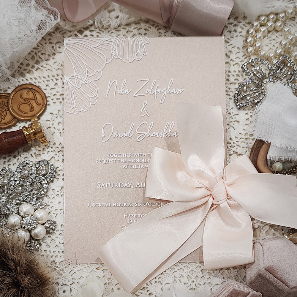 Invitation 5111: Acrylic - Clear, Blush Pearl, Petal Pink Ribbon - acrylic invite with white ink floral design and blush bow