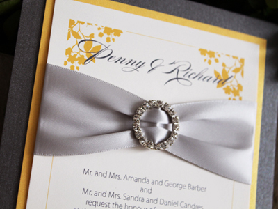 Invitation 922: Charcoal Pearl, Mango Pearl, Cream Smooth, Silver Ribbon, Brooch/Buckle L