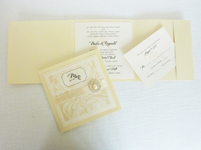 Invitation 923: Buttermilk Pearl, Ivory Pearl, Cream Smooth, Cream Ribbon, Brooch/Buckle G