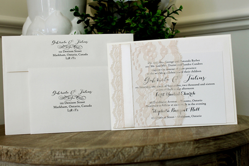 Invitation 1503: White Gold, Ivory Pearl, Cream Smooth, Cream Ribbon, Cream - Thin Lace - This invite uses a combination of our thick and thin lace as well as satin ribbon to create a pocket that holds the invitation wording detail.