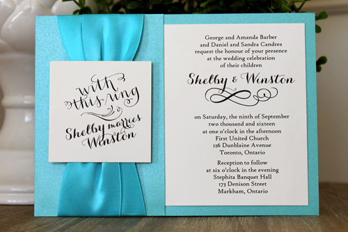 Invitation 1516: Tiffany Pearl, Cream Smooth, Turquoise Ribbon, Turquoise Ribbon - This invite is layered with two thick ribbons along the side and a tag over the ribbons.