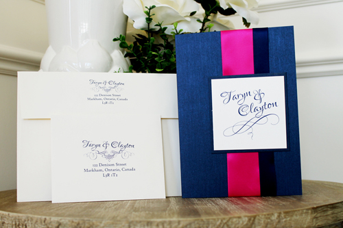 Invitation 1517: Navy Pearl, Navy Pearl, Cream Smooth, Azalea Ribbon, Navy Ribbon - This striking navy and magenta invite uses navy pearl as the folder paper and a thick azalea and thiner navy ribbon.