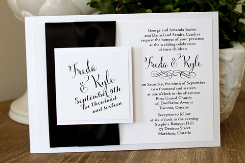 Invitation 1518: Black and white invites can look very sharp.  This invite has thick black ribbons on the side contrasted with white paper below and white tag on the black ribbon.