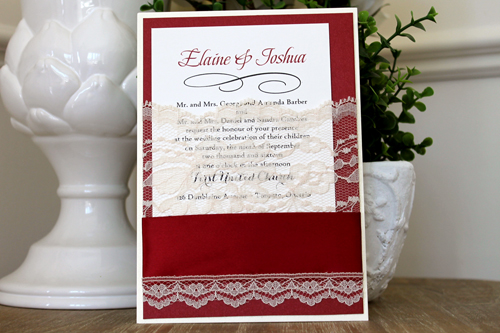 Invitation 1539: This deep red lacy invite has a nice vintage theme with bold colors,  The lace and thick satin ribbon wraps around a deep red paper creating a pocket to hold the invitation wording card.