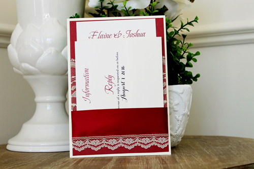 Invitation 1539: This deep red lacy invite has a nice vintage theme with bold colors,  The lace and thick satin ribbon wraps around a deep red paper creating a pocket to hold the invitation wording card.