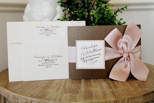Invitation 1543: This is a chocolate brown invite that folds like a book and tied closed with a beautiful thick deep blush bow.  There is a pocket on the inside left and the invite wording on the right.