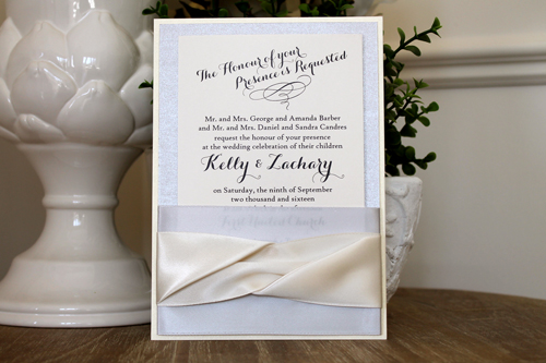 Invitation 1544: White Gold, Silver Ore, Cream Smooth, Silver Ribbon, Silver Ribbon, Antique Ribbon, Antique Ribbon - This is a portrait invite that uses four thick ribbons wrapped around a silver backing to create a pocket that holds the invitation wording.